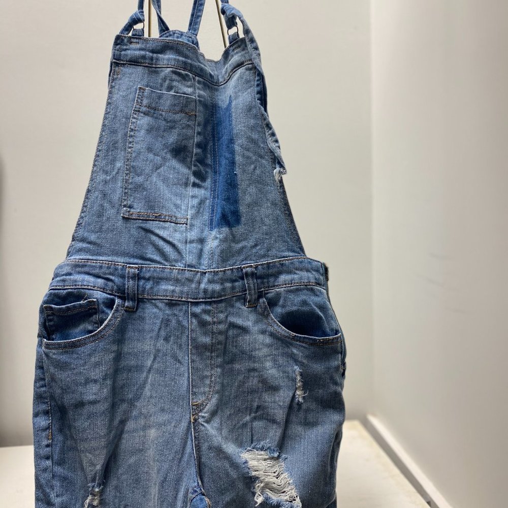 Blue Jean Overalls with Rips and Pockets